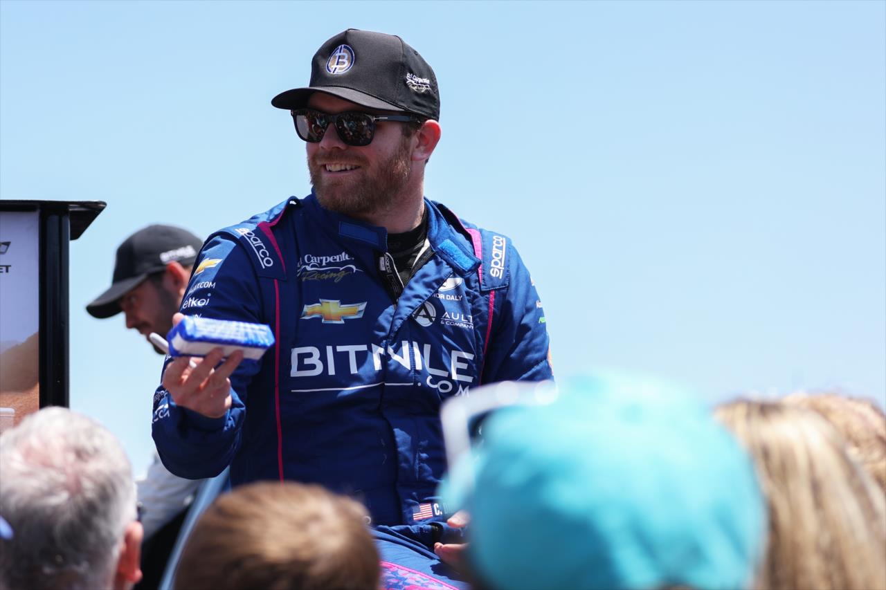 Conor Daly tosses out ice cream - Miller Lite Carb Day - By: Amber Pietz -- Photo by: Amber Pietz